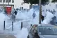 French police fire tear gas grenades to protesters during a gathering of the 
