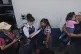 Relatives of unaccompanied minors deported from the United States await updates outside La Aurora International Airport, in Guatemala City, August 31, 2025