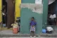 People look out at a street in the Simon-Pele neighborhood of Port-au-Prince, Haiti, September 22, 2025