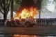 A police vehicle burns as a right-wing demonstration erupted into violence and chaos as rioters clashed with police, September 20, 2025 in The Hague, Netherlands. Photo: REGIO8 via AP