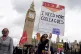 NHS workers take part in a march from St Thomas' Hospital to Trafalgar Square, London, as members of the Royal College of Nursing (RCN) and the Unite union continue their strike action in a dispute over pay, May 1, 2023