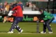 England's Rehan Ahmed (left) batting while Ireland wicket keeper Lorcan Tucker looks on during the Third Men's International Twenty20 match at Malahide Cricket Club in Dublin, Ireland, September 21, 2025
