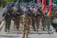 UN peacekeepers from different national contingents march during a ceremony to mark the 47th anniversary of UNIFIL Establishment Day, at the United Nation Peacekeepers headquarters in the southern Lebanese town of Naqoura, Lebanon, March 19, 2025