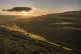 Morning sunlight illuminates a valley and the River Swale near Hawes in the Yorkshire Dales National Park