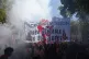 DEFIANT: Protesters holding a banner reading : ‘Macron resignation, general strike’ attend a demonstration called by major trade unions to oppose budget cuts, in Paris, France, September 18 2025