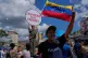 A man holds a doll of late President Hugo Chavez near the United Nations' office in Caracas, Venezuela, during a government-organised rally against foreign interference, October 6, 2025