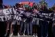 Protesters gesture during a protest calling for President Andry Rajoelina to step down in Antananarivo, Madagascar, October 14, 2025