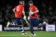 England's Phil Salt (left) and Harry Brook make runs against New Zealand during their T20 cricket match in Christchurch, New Zealand, October 20, 2025