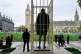 A team of Greenpeace activists install prison bars around three iconic statues - Nelson Mandela, Mahatma Gandhi and the Suffragist Millicent Fawcett - in Parliament Square