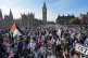 People on Westminster Bridge as they take part in a Palestine Solidarity Campaign march in central London, October 11, 2025