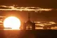 27/04/20 of the sun rising behind a redundant oil platform moored in the Firth of Forth near Kirkcaldy, Fife