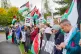 People take part in a demonstration outside the head office of Ultra Precision Control Systems in Cheltenham, part of a protest by pro-Palestine campaigners at sites across the country supplying F-35 fighter jet parts used by Israel to bombard the Gaza Strip, October 8, 2025