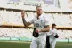 England's captain Ben Stokes acknowledges the fans as he walks out with the teammates at the end of the day one of the first Ashes cricket test match between Australia and England in Perth, November 21, 2025