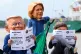 Oxfam activists wear puppet heads in the likeness of US President Donald Trump (left) President of the European Commission Ursula von der Leyen (centre) and President of Argentina Javier Milei as they protest ahead of the Cop30 UN Climate Summit in Belem, Para state, Brazil, November 5, 2025