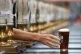 A pint of real ale is passed across one of the bars at the Great British Beer festival 2016 at Olympia in London