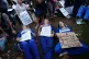 Protesters take part in a Lift the Ban on Palestine Action protest organised by Defend our Juries in Parliament Square in London, September 6, 2025
