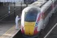 A forensic investigator on the platform by the train at Huntingdon train station in Cambridgeshire, after a number of people were stabbed on the train on Saturday. Two people have been arrested after British Transport Police were called to the incident. Picture date: Sunday November 2, 2025