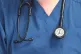 A doctor holding a stethoscope at the Royal Liverpool University Hospital, Liverpool, August 2014