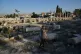 A Palestinian visitor takes a photo at the Roman historical site in the West Bank town of Sebastia, November 20, 2025