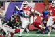 New York Giants running back Devin Singletary (26) scores a touchdown against New England Patriots safety Jaylinn Hawkins (21) during the second half of an NFL football game, December 1, 2025, in Foxborough, Mass. 