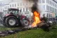 Protestors burn tires during a demonstration of European farmers outside the EU Summit meeting in Brussels, December 18, 2025
