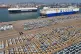 Vehicles and trucks for export wait for transportation from a port in Yantai in eastern China's Shandong province on January 2, 2025