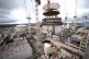 INTERMINABLE DELAYS: The lifting of a 245-tonne steel dome onto Hinkley Point C's second reactor building, at in Bridgwater, Somerset on July 17 2025 - scheduled to be finished by 2025 it now won’t be until 2031