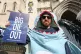 Campaigners from Oceana UK protest outside the Royal Courts of Justice in London, where the environmental group is taking the government to court over 31 licences for oil and gas exploration, March 26, 2025