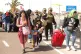 IRON FIST: Mass exodus of Latin American migrants cross from Chile at the Santa Rosa border point in Tacna, Peru on Monday in a panic reaction at Jose Antonio Kast’s threats of expulsion