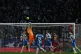 Barcelona's goalkeeper Joan Garcia (top) clears the ball during the Spanish La Liga soccer match between RCD Espanyol and Barcelona in Barcelona, Spain, January 3, 2026