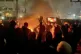 In this frame grab from footage circulating on social media shows protesters dancing and cheering around a bonfire as they take to the streets despite an intensifying crackdown as the Islamic Republic remains cut off from the rest of the world, in Tehran, Iran, Friday, Jan. 9, 2026