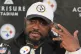 Former Pittsburgh Steelers head coach Mike Tomlin talks with reporters following an NFL wild-card playoff game against the Houston Texans in Pittsburgh, January 12, 2026