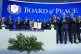 President Donald Trump, center, holds up a signed Board of Peace charter during the Annual Meeting of the World Economic Forum in Davos, Switzerland, Thursday, Jan. 22, 2026