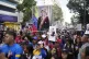 Government supporters carry portraits of kidnapped President Nicolas Maduro during a rally marking the anniversary of the 1958 coup that overthrew Venezuelan dictator Marcos Perez Jimenez, in Caracas, Venezuela, January 23, 2026