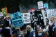 Protesters gather at Embarcadero Plaza for a protest in San Francisco, January 24, 2026, in response to a fatal shooting in Minneapolis