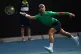 Novak Djokovic of Serbia plays a forehand return to Lorenzo Musetti of Italy during their quarterfinal match at the Australian Open tennis championship in Melbourne, Australia, January 28, 2026