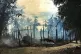 In this September 7, 2017, file photo, smoke rises from a burned house in Gawdu Zara village, northern Rakhine state, where the vast majority of the country's 1.1 million Rohingya lived, Myanmar