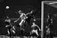 Arsenal goalkeeper Pat Jennings punches the ball clear from Manchester United's Gordon McQueen (centre left), February 23, 1983