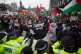 Metropolitan Police officers form a cordon at Parliament Square to prevent protesters reaching Westminster Bridge during a Free Palestine Coalition demonstration in central London, January 6, 2024