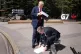 Prime Minister Keir Starmer picks up UK-US trade deal papers dropped by US President Donald Trump before speaking to the media at the G7 summit in Kananaskis, Alberta, Canada, December 15, 2025