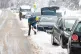 A man clearing the snow from his car at Glen More, by Loch Morlich as heavy snow continues to cause disruption to many part of the Highlands. Hundreds of schools in northern Scotland will remain closed for a third day as much of the country braces itself for further snow and icy conditions. Temperatures are expected to drop as low as minus 6C in parts of rural Scotland, January 7, 2026