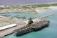 SAME OLD SAME OLD: The USS Saratoga became the fist aircraft carrier to pull up pierside at Diego Garcia in December 1985 / Pic: PD Goodrich/CC