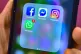 Facebook, Messenger, Instagram and WhatsApp, social media app icons on a smart phoneFacebook, Messenger, Instagram and WhatsApp, social media app icons on a smart phone