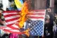 Government supporters burn a U.S. flag in Caracas, Venezuela, January 3, 2026, after U.S. President Donald Trump announced that U.S. forces had captured Venezuelan President Nicolás Maduro and his wife