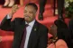Rev. Jesse Jackson gestures to a friend in the balcony at the 16th Street Baptist Church in Birmingham, Ala., September 15, 2013