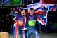 Britain's gold medalists Matt Weston (right) and Britain's Tabitha Stoecker (left) celebrate at the finish during the skeleton mixed team competition at the 2026 Winter Olympics, in Cortina d'Ampezzo, Italy, February 15, 2026