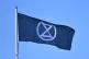 An Extinction rebellion flag at The New Lawn, Nailsworth