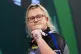 England's Beau Greaves celebrates winning the second set during her match against Northern Ireland's Daryl Gurney on day nine of the Paddy Power World Darts Championship at the Alexandra Palace, London, December 19, 2025