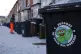A sticker supporting the strikes on a bin as agency refuse workers collect rubbish in the Saltley area of Birmingham, January 6, 2026