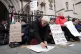 Protesters write on placards outside the High Court, central London, where Dame Victoria Sharp, Mr Justice Swift and Mrs Justice Steyn will deliver their ruling in the legal action taken by Palestine Action co-founder Huda Ammori, February 13, 2026